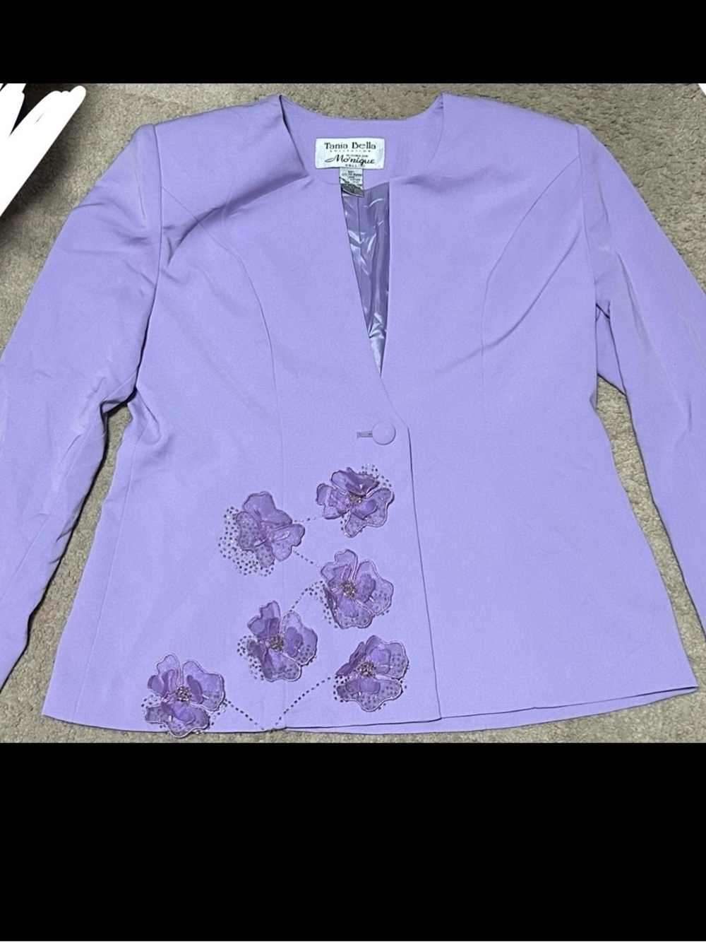 Tania Bella’s collection Purple floral blazer with beaded details and sequins